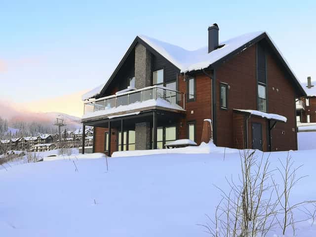 Ski-in/ski-out semi-detached house in Sadeln with sauna, fireplace, balcony and patio