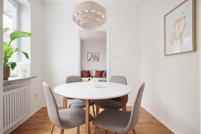 Studio apartment interior, kitchenette, cozy living area, local cafés and shops nearby, Sundbyberg