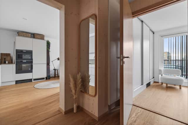 Interior of a light-filled Kungsholmen apartment in Scandinavian style with wooden details
