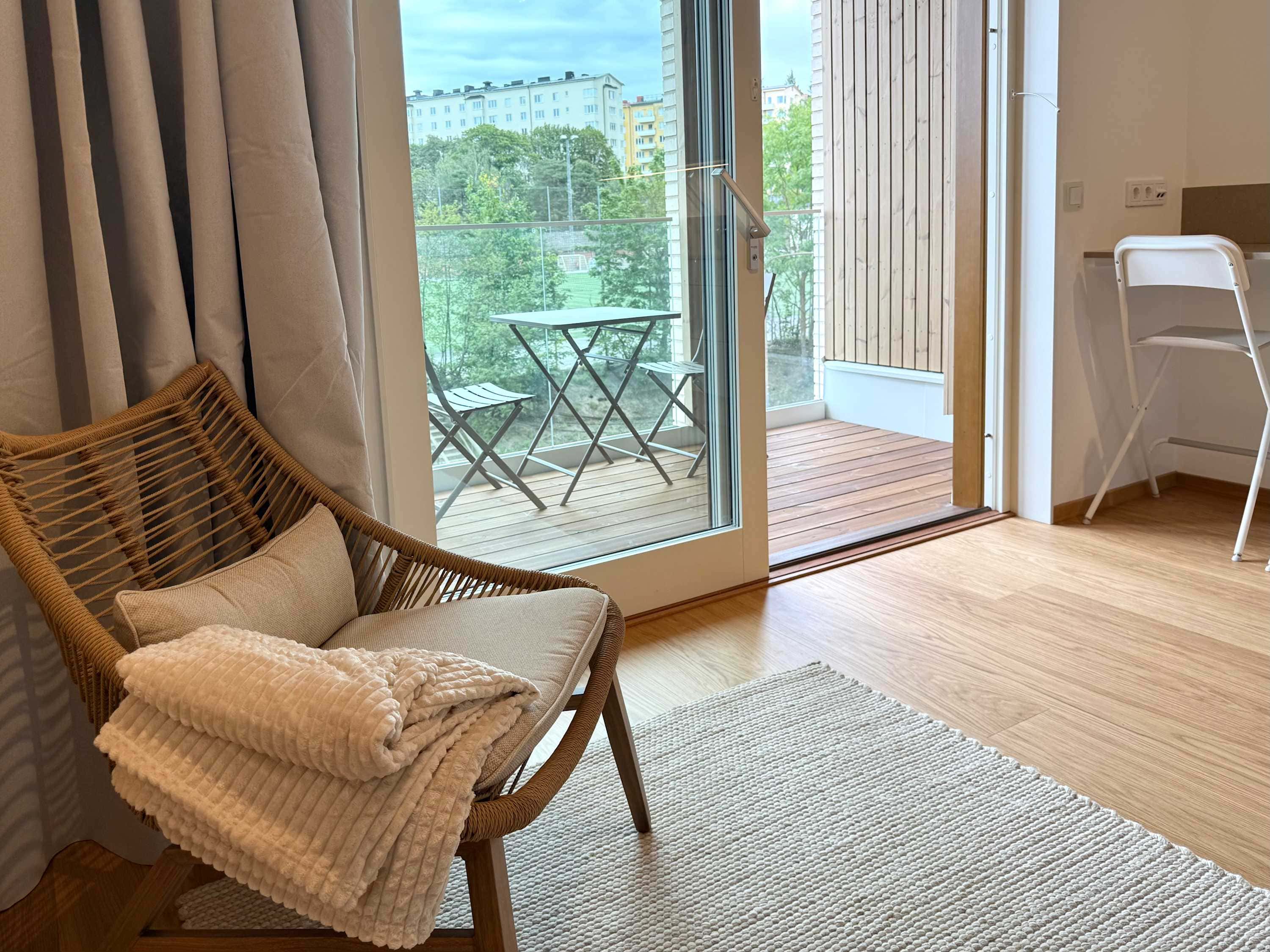 Modern studio interior in Kungsholmen, private balcony for coffees, large courtyard space