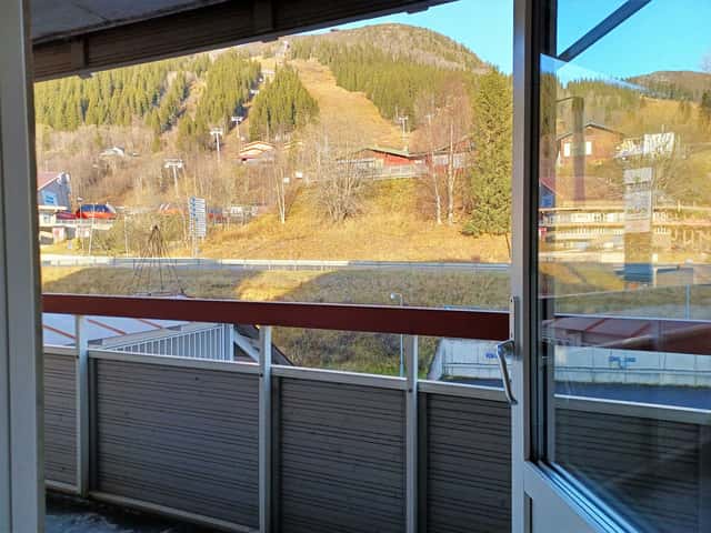 Ski-in/ski-out apartment in central Åre with private sauna near the slope, lifts and village square