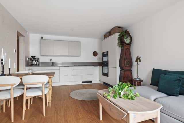 Interior of a light-filled Kungsholmen apartment in Scandinavian style with wooden details