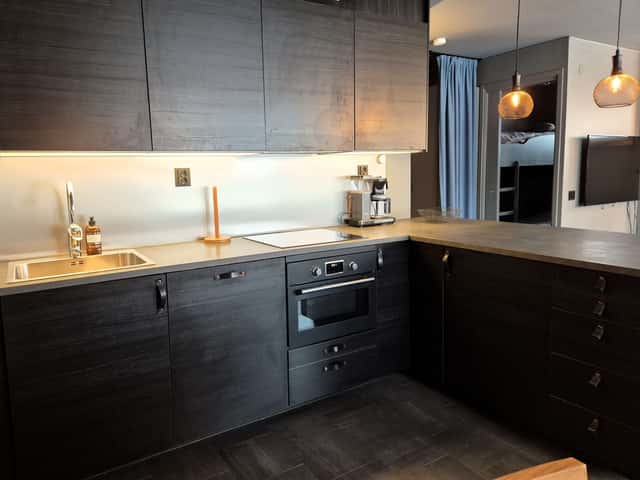 Ski-in/ski-out apartment in central Åre with private sauna and south-facing patio near the slopes