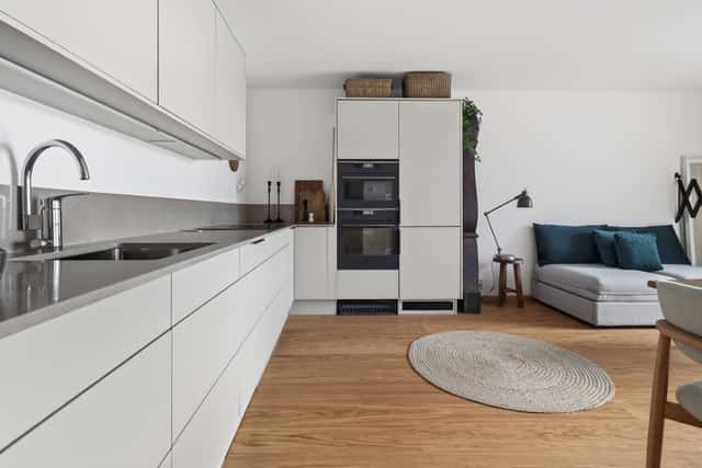 Interior of a light-filled Kungsholmen apartment in Scandinavian style with wooden details