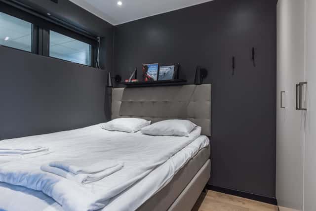 Modern kitchen in Åre apartment, stylish bathroom interior, cozy living area with mountain view