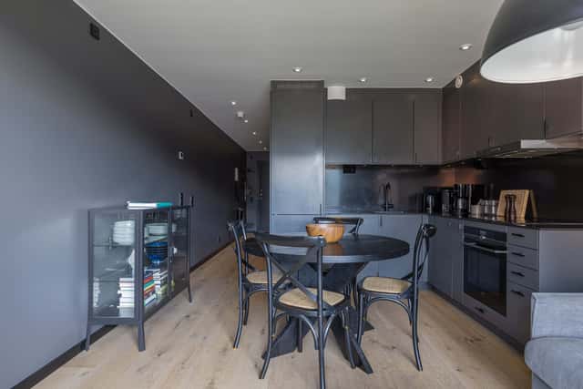 Modern kitchen in Åre apartment, stylish bathroom interior, cozy living area with mountain view