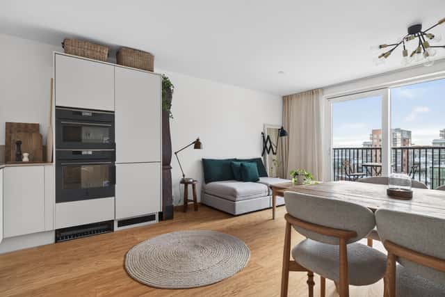 Interior of a light-filled Kungsholmen apartment in Scandinavian style with wooden details