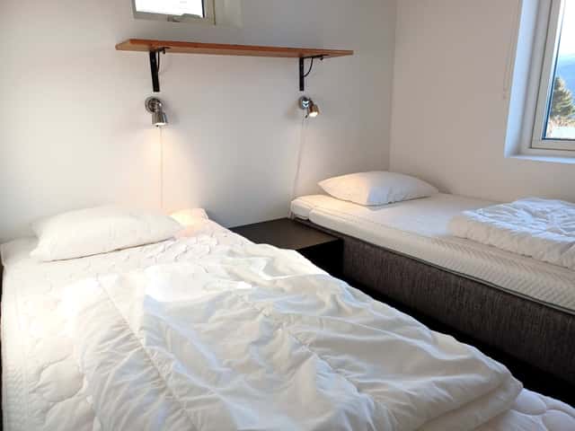 120 sqm apartment in Åre for 16 guests with south-facing balcony, open-plan kitchen and two private saunas