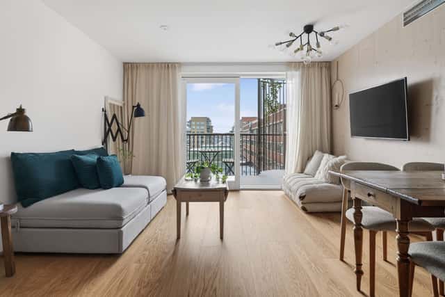 Interior of a light-filled Kungsholmen apartment in Scandinavian style with wooden details