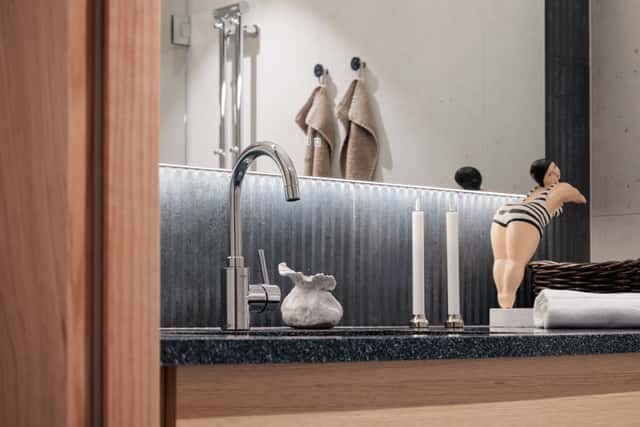 Interior of a light-filled Kungsholmen apartment in Scandinavian style with wooden details
