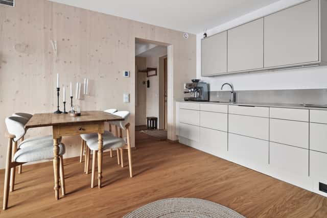 Interior of a light-filled Kungsholmen apartment in Scandinavian style with wooden details