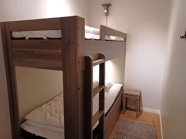 Ski-in/ski-out family apartment in Sadeln with sauna, indoor fireplace and south-facing patio