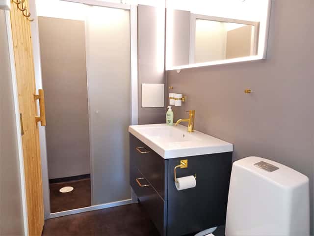 Ski-in/ski-out apartment in central Åre with private sauna near the slope, lifts and village square