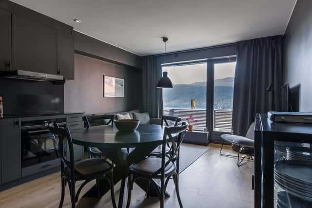 Modern kitchen in Åre apartment, stylish bathroom interior, cozy living area with mountain view