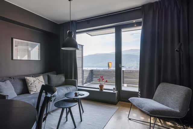 Modern kitchen in Åre apartment, stylish bathroom interior, cozy living area with mountain view