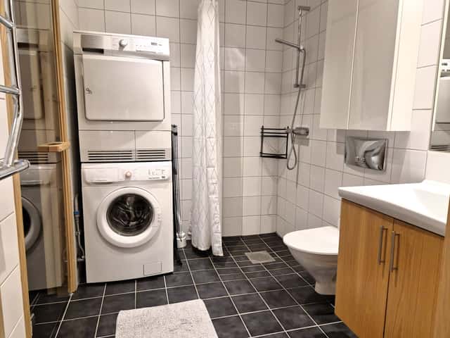 Central apartment in Åre near ski lifts with private sauna, garage parking and ski storage