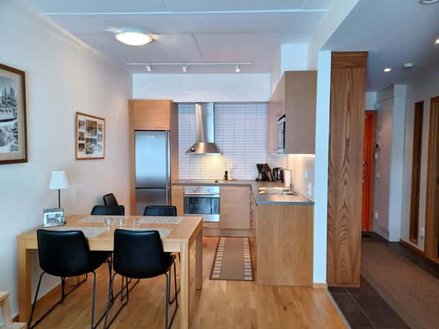 Central Åre apartment close to ski lifts and village restaurants, with ski storage and free garage parking