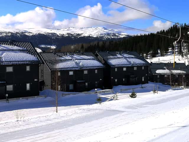 Ski-in/ski-out semi-detached home in Björnen Sadeln with fireplace and private sauna