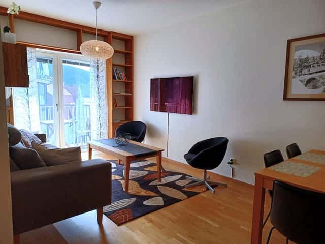 Central Åre apartment close to ski lifts and village restaurants, with ski storage and free garage parking