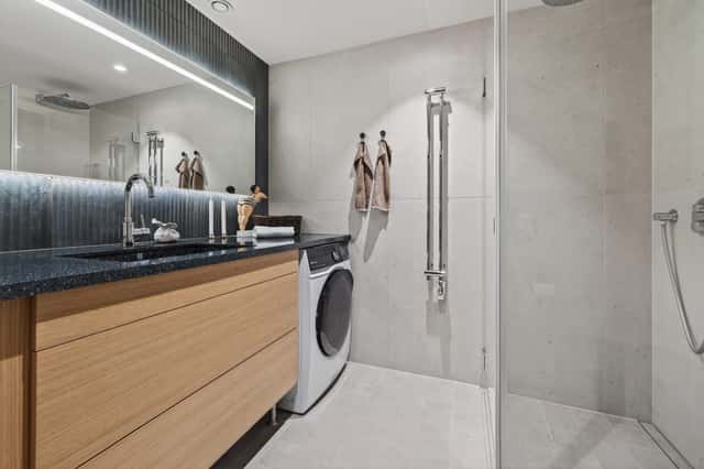 Interior of a light-filled Kungsholmen apartment in Scandinavian style with wooden details