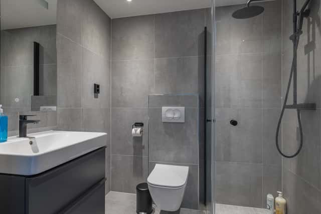 Modern kitchen in Åre apartment, stylish bathroom interior, cozy living area with mountain view