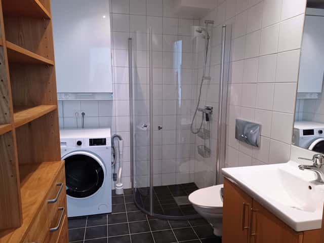 Central Åre apartment close to ski lifts and village restaurants, with ski storage and free garage parking