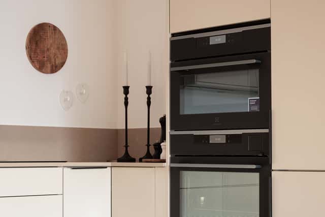 Interior of a light-filled Kungsholmen apartment in Scandinavian style with wooden details