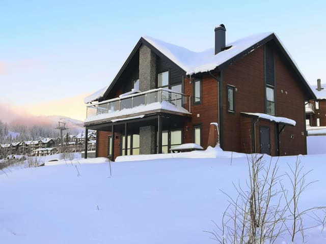 Ski-in/ski-out semi-detached house in Sadeln with sauna, fireplace, balcony and patio