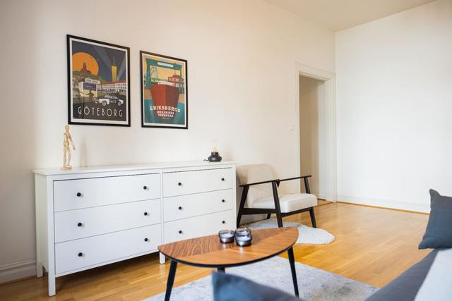 Spacious living room in Gothenburg apartment.