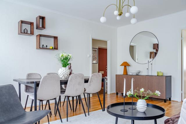 Living room with dining area in Sundbyberg