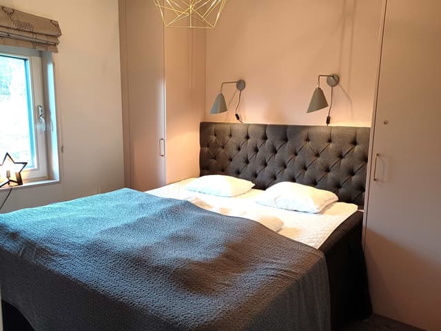 Modern apartment in Åre near the square with fireplace, private sauna, balcony and easy access to ski lifts.