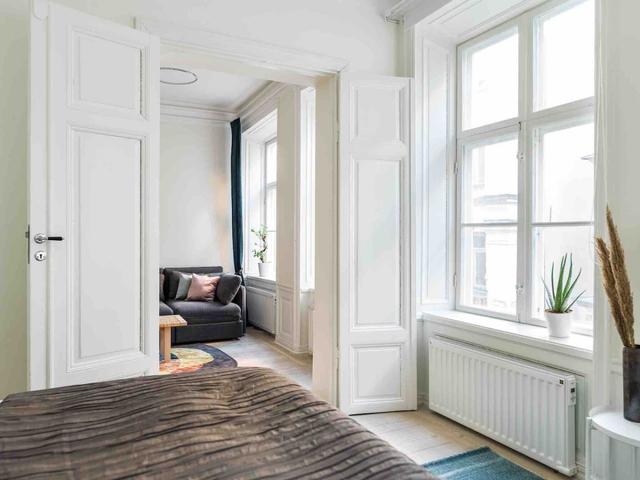 Bright living room in Old Town Stockholm with high ceilings