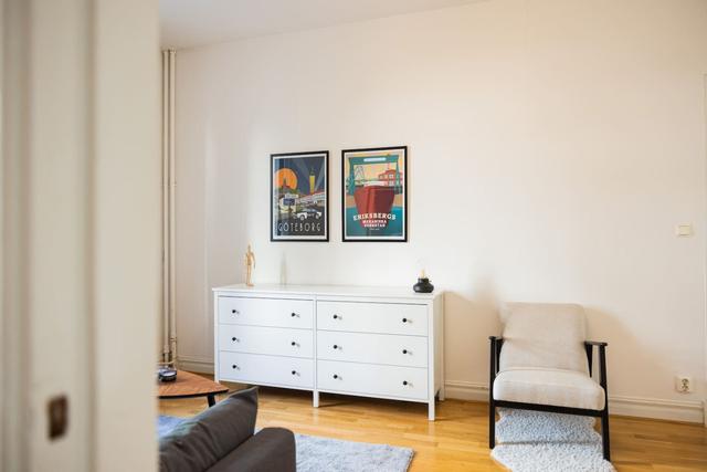 Spacious living room in Gothenburg apartment.