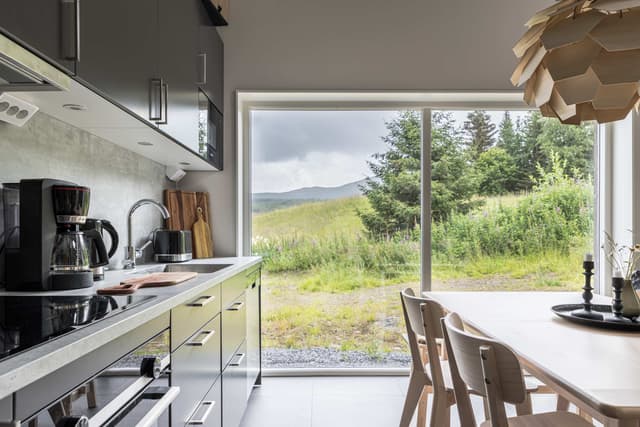 Modernt fristående fjällhus med öppen spis i Årekläppen, Åre