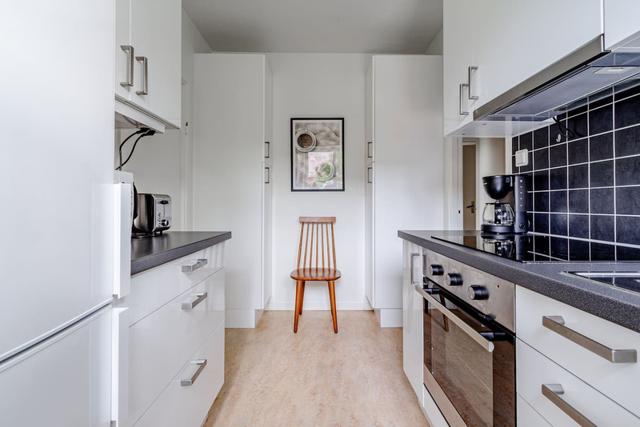 Living room with dining area in Sundbyberg