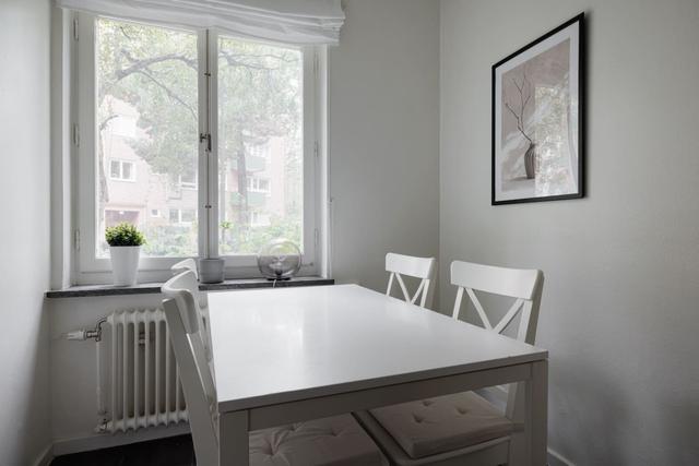 Spacious kitchen with dining area in Solna apartment