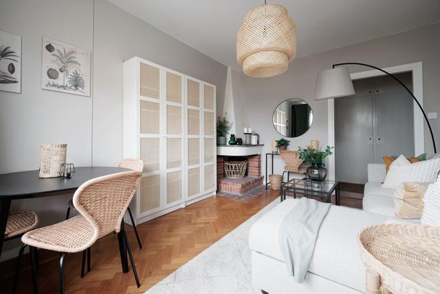 Spacious and bright living area in Stockholm apartment.