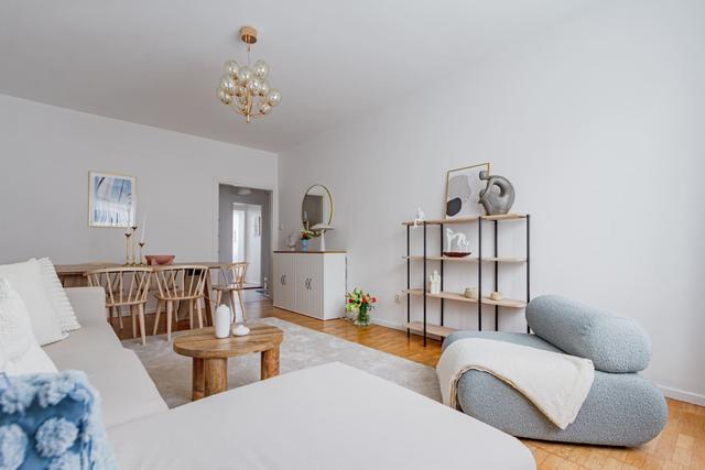 Bright living room in Sundbyberg apartment.