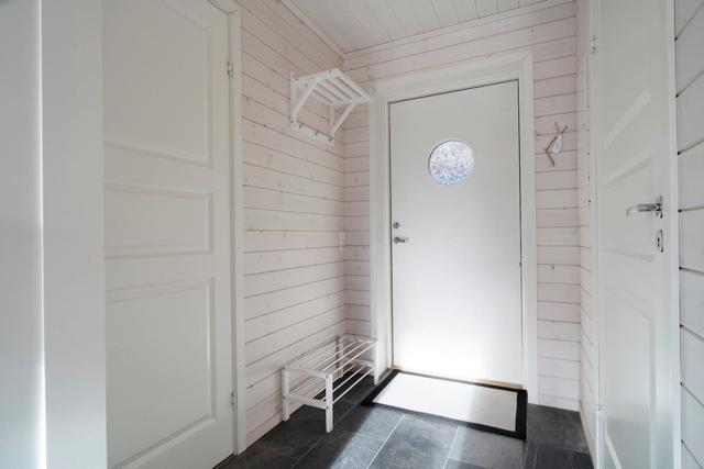 Cozy living room in Tegefjäll apartment with natural light.