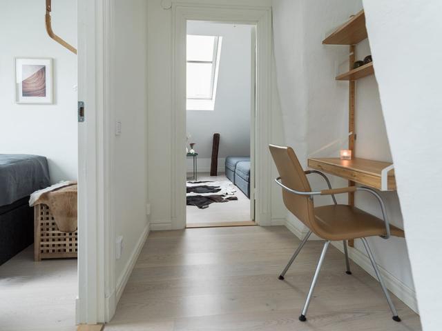 Bright attic apartment in Old Town Stockholm with modern design.