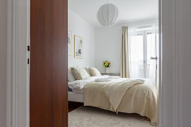 Bright living room in Sundbyberg apartment.