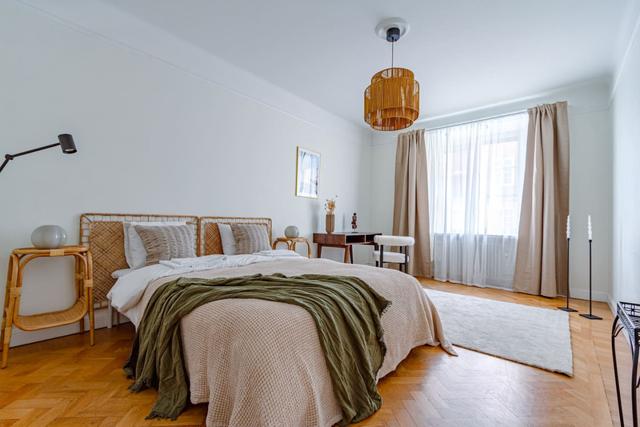 Spacious living room with sofa bed in Vasastan, Stockholm.