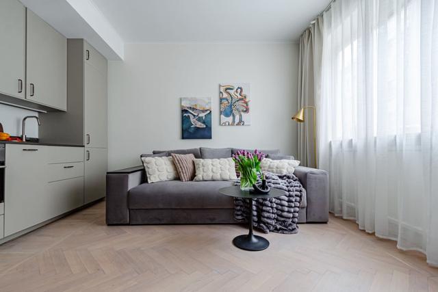 Södermalm studio apartment with modern furnishings and natural light.