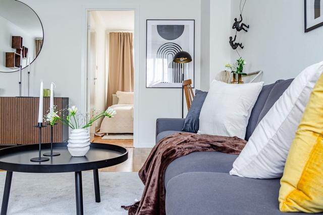 Living room with dining area in Sundbyberg