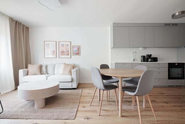 Bright living room, modern kitchen, cozy master bedroom and sleek bathroom in SoFo apartment, Stockholm