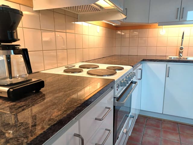Central Åre apartment with private sauna, ski storage and drying cabinet, near village and mountain trails.