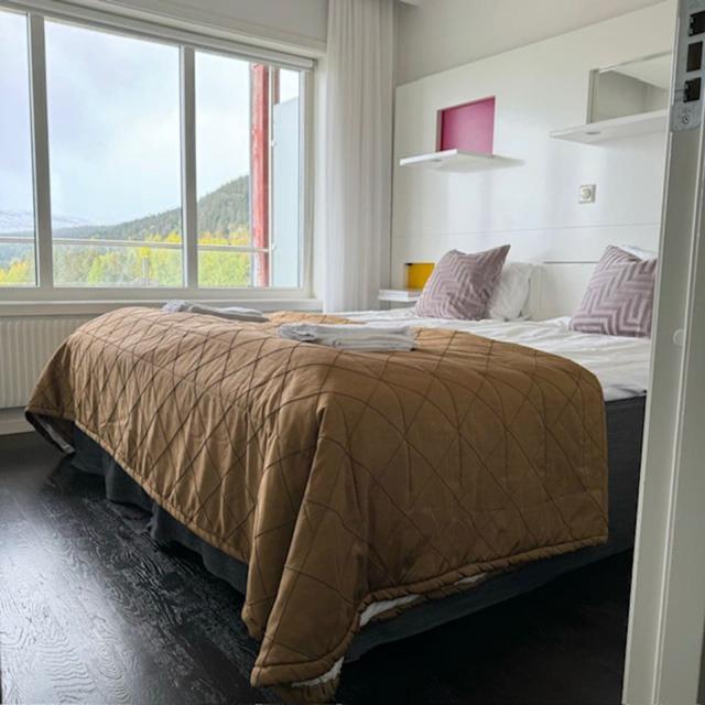 Living room with sofa bed in Åre's TOTT building.