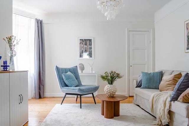 Spacious living room with sofa bed in Vasastan, Stockholm.