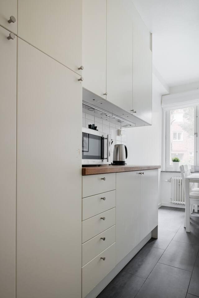 Spacious kitchen with dining area in Solna apartment