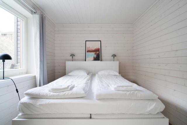 Cozy living room in Tegefjäll apartment with natural light.